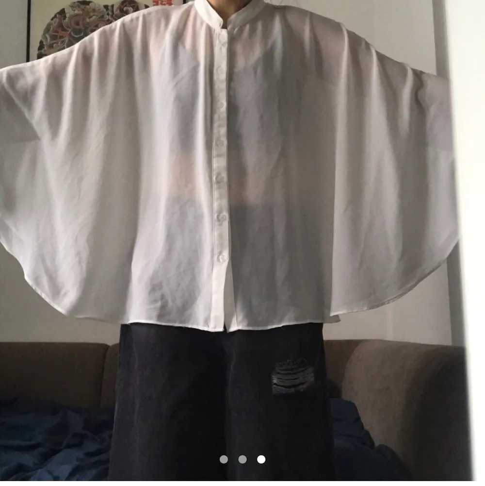 FREE TRACKED SHIPPING.   Nehru collar button down placket. Batwing cape sleeves. Tag size (Korean) XS but definitely fits S and some M. Bought from StyleNanda. One Size Fits Most. (I'm 5'4 and 98 lbs for reference!)  Worn twice then hand washed, NOT machine dried. Gently used excellent used condition. No holes, tears, rips, stains, snags. Smoke and pet free storage space. No other flaws to note.  Happy to bundle. Will gladly take more pics.  Disclaimer: Please expect some general wear in all secondhand pre-owned items as they have lived a previous life, so do not expect a mint item. . Toppar.