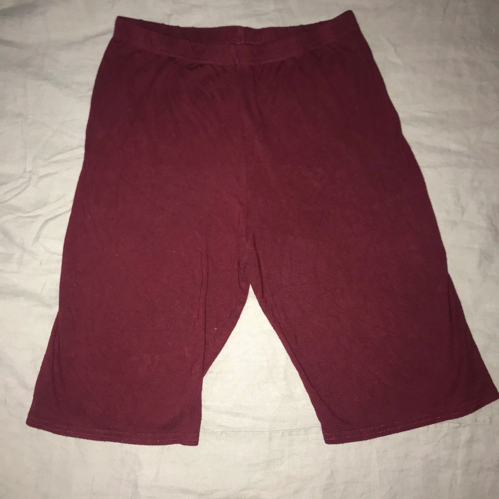Bought from second hand. Tag size US 6 / EU 36. “bike shorts are an essential for the new season and we are loving this basic style. Featuring a maroon jersey material, team them with a maroon hue cropped sweater for a look we're loving.” No holes, tears, rips, stains, fading. Label and care instructions tags removed cuz they’re itchy. Smoke and pet free storage space. No other flaws to note. Disclaimer: Please expect some general wear in all secondhand pre-owned items as they have lived a previous life, so do not expect a mint item. . Shorts.