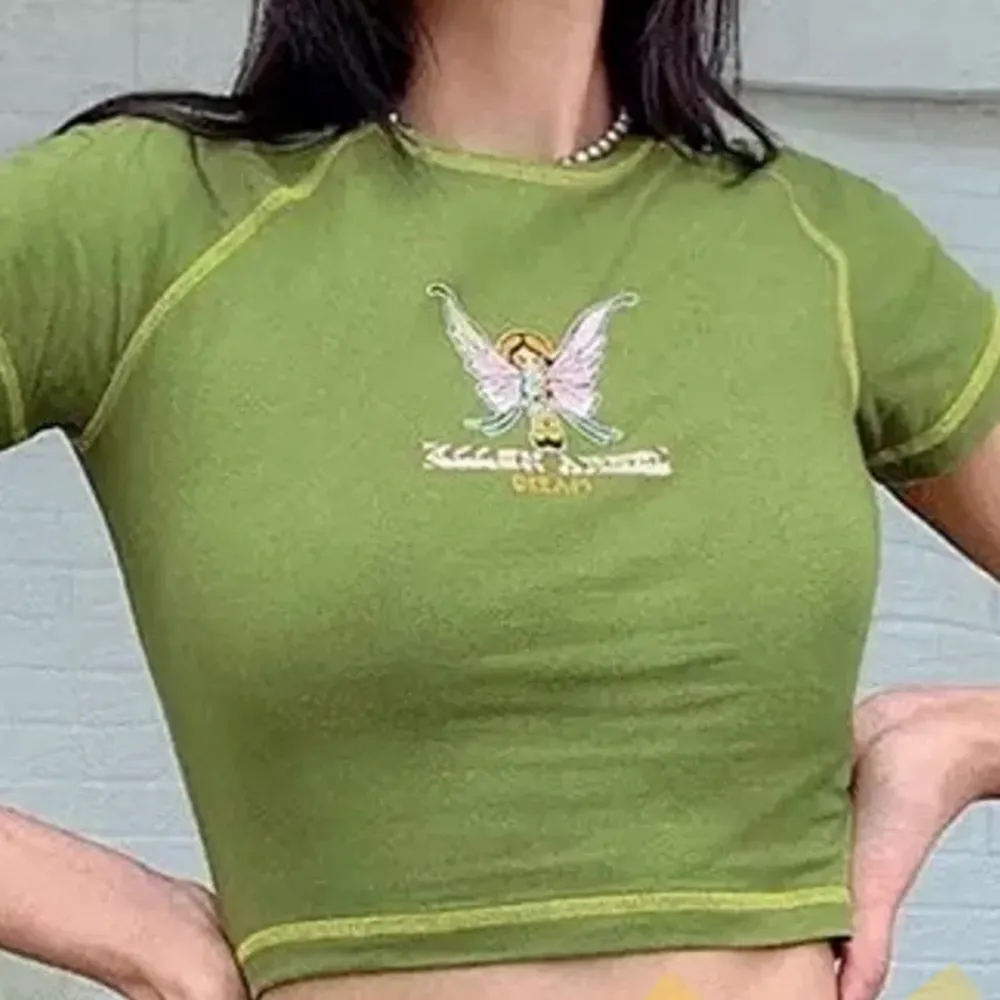 Grön populär tshirt med tryck av en älva🥰🥰. T-shirts.