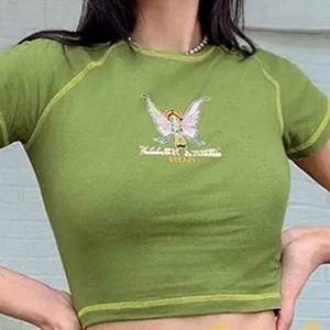 Grön populär tshirt med tryck av en älva🥰🥰
