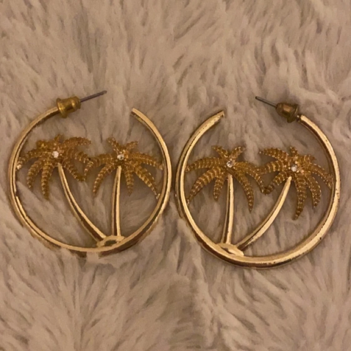 Guldiga Palm örhängen