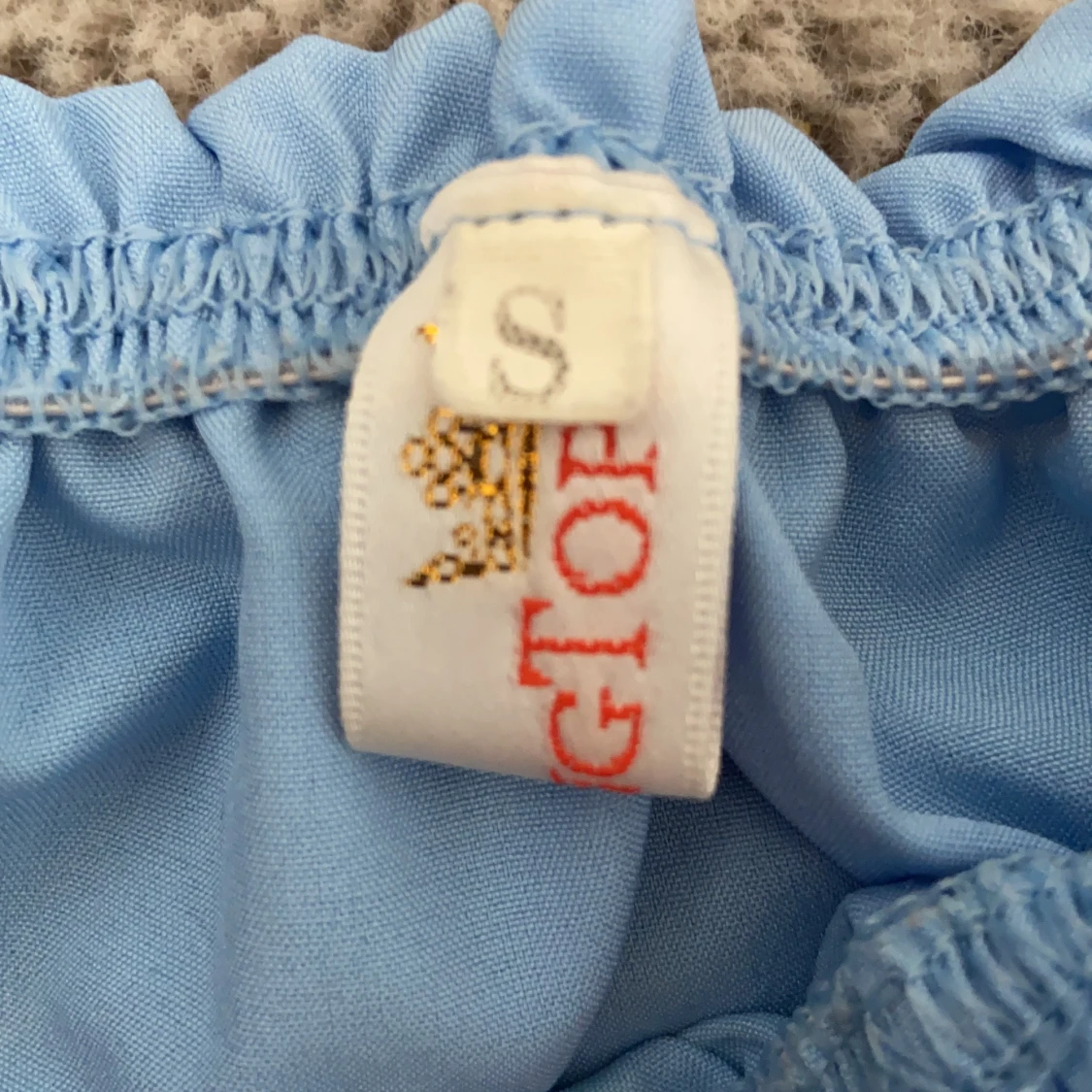 En blå offshoulder i stl S - 91