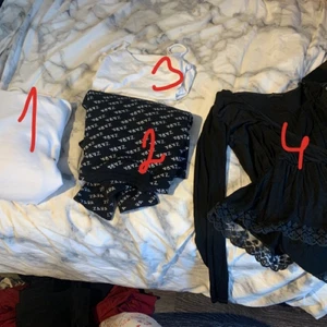 Flera plagg - 1 en vit hoodie från hm, så skön och superfin, 2, en superfin, tjock och skön tröja från Zara, 3, ett fint vitt linne med spagettiband, 4 en superfin omlott tröja med spets längst ned, vid intresse av någon av plaggen eller alla så kontakta mig, säljer bort billigt och pris kan alltid diskuteras🤎🤎
