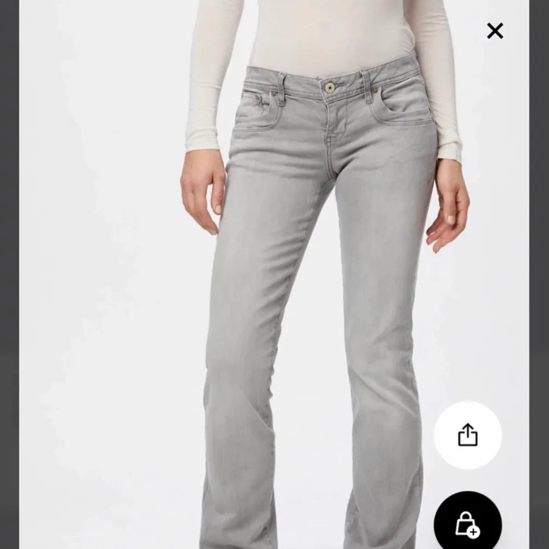 Ljusgråa bootcut jeans lågmidjade