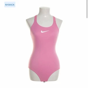 Nike strl L - Rosa Nike baddräkt , köpte men passade inte! Strl L men  passar mer M / S 