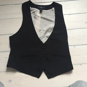 Oanvänd svart väst! - Superfin svart väst! Passar XS-liten M