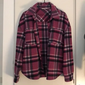 Shirt 10% wool from Clockhouse - Beautiful shirt in different shades of purple, 10% wool, size EU 38 from the brand Clockhouse. Never worn in perfect condition.