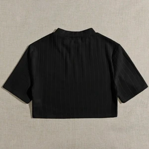 Svart topp - Helt oanvänd coppad topp i ribbat material!