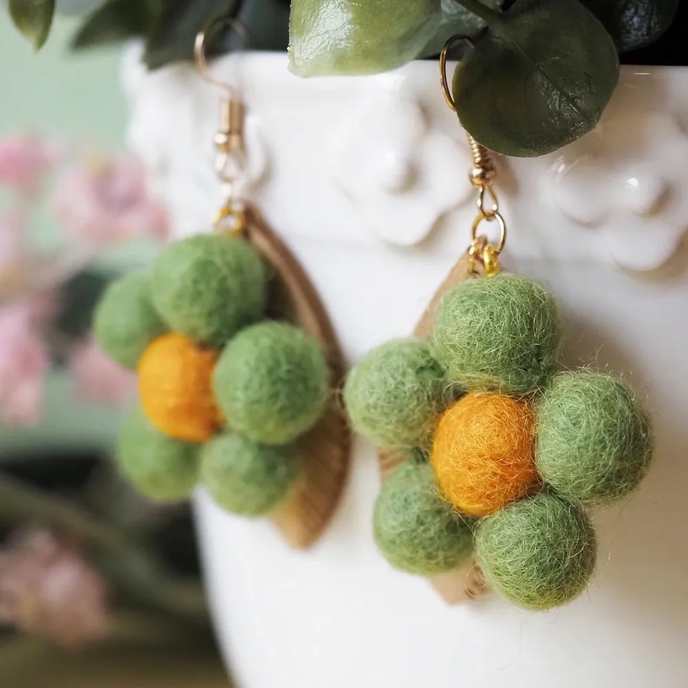 Lovely three different color wool felt stack earring. Very cute and will bring up your day :), specially during autumn.    The earring are handmade by me with love. The earrings are made from wool. I sew it together to make it last long. . Accessoarer.