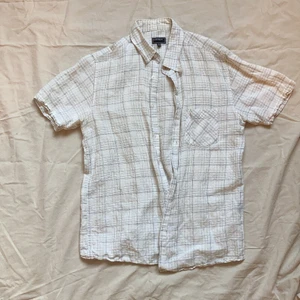 Rutig skjorta  - Rutig skjorta från eastwest - passar både kille och tjej. Storlek M