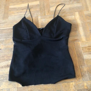 Top - En top i storleken S från Nelly