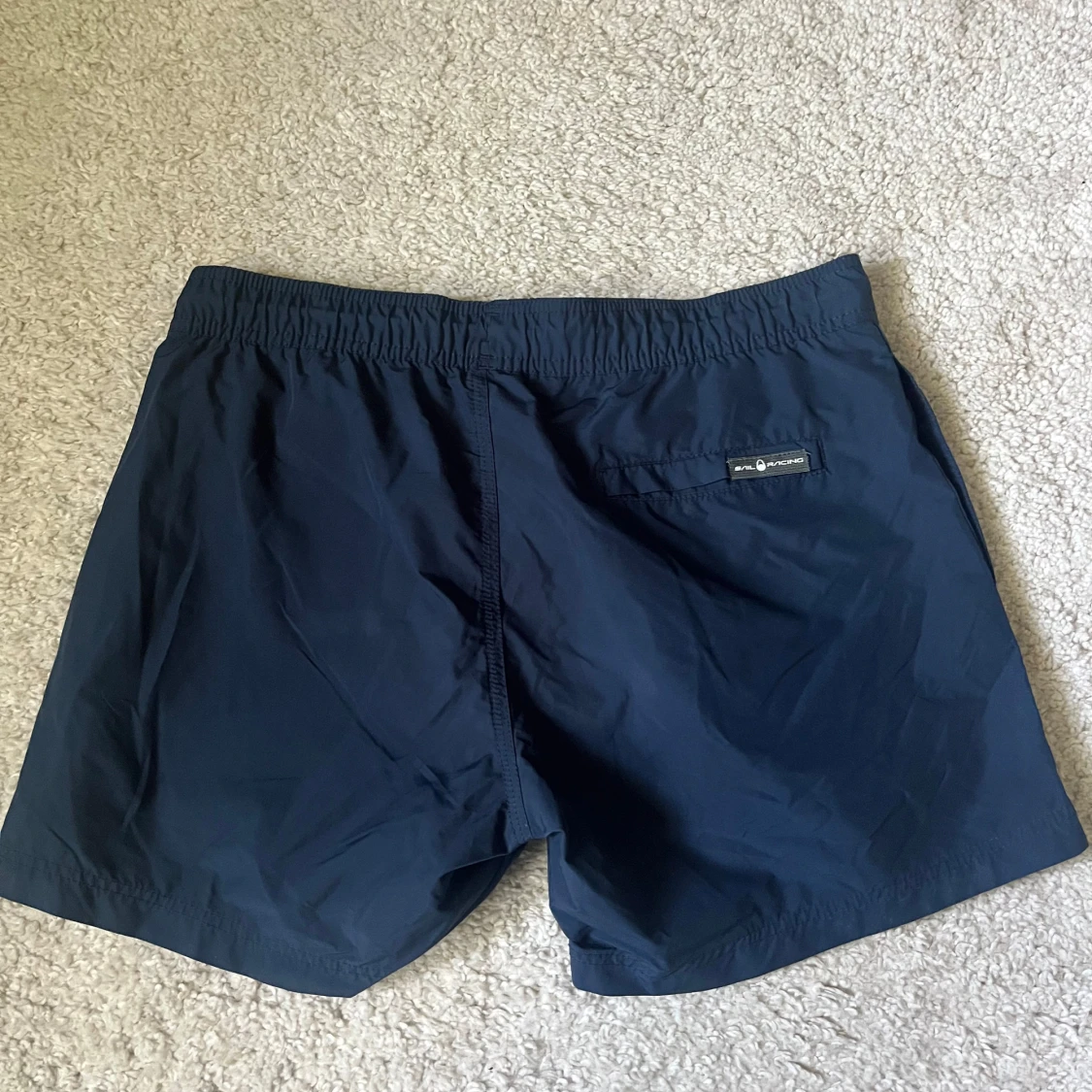 Marinblå badshorts från Sail Racing - 1