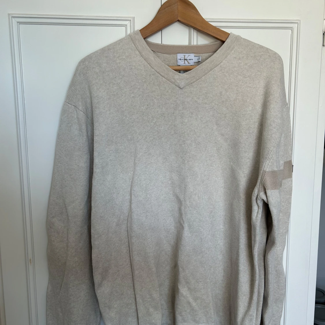 Vintage Beige v-ringad tröja Calvin Klein 