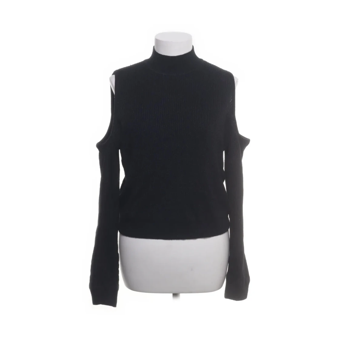 Svart stickad tröja med öppna axlar