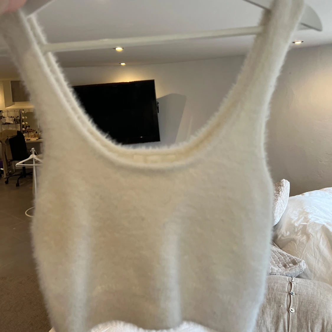 Vit fluffig linnetopp