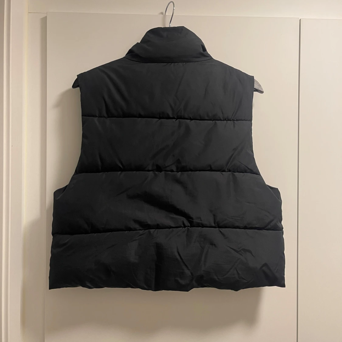 Svart dunväst från 157 - 1