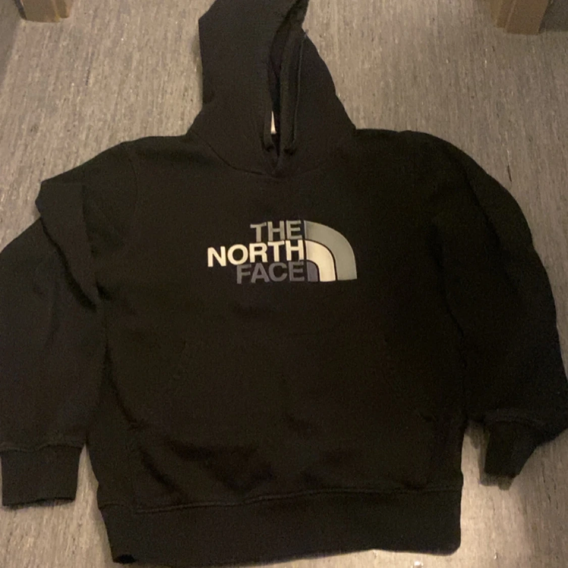 Svart hoodie från The North Face