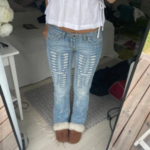 Jeans lowwaist utsvängda lågmidjade bootcut low ripped håliga slitningar  - Coola jeans💋💋