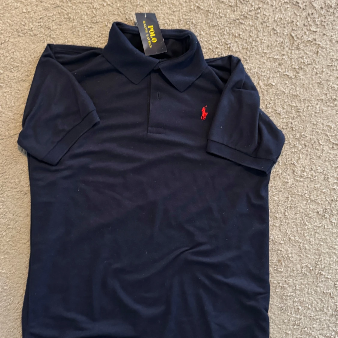 Mörkblå pikétröja från Polo Ralph Lauren