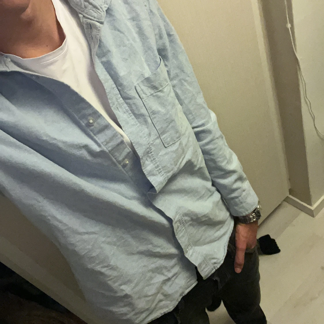 Ljusblå bomullsskjorta med knappar