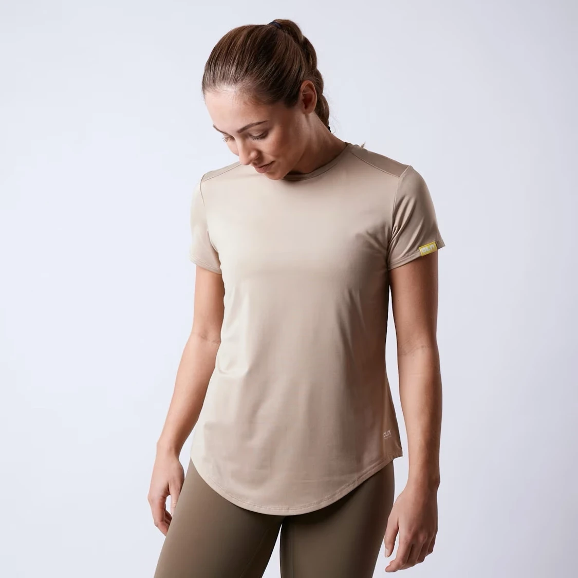 Beige träningstshirt från CLN Athletics