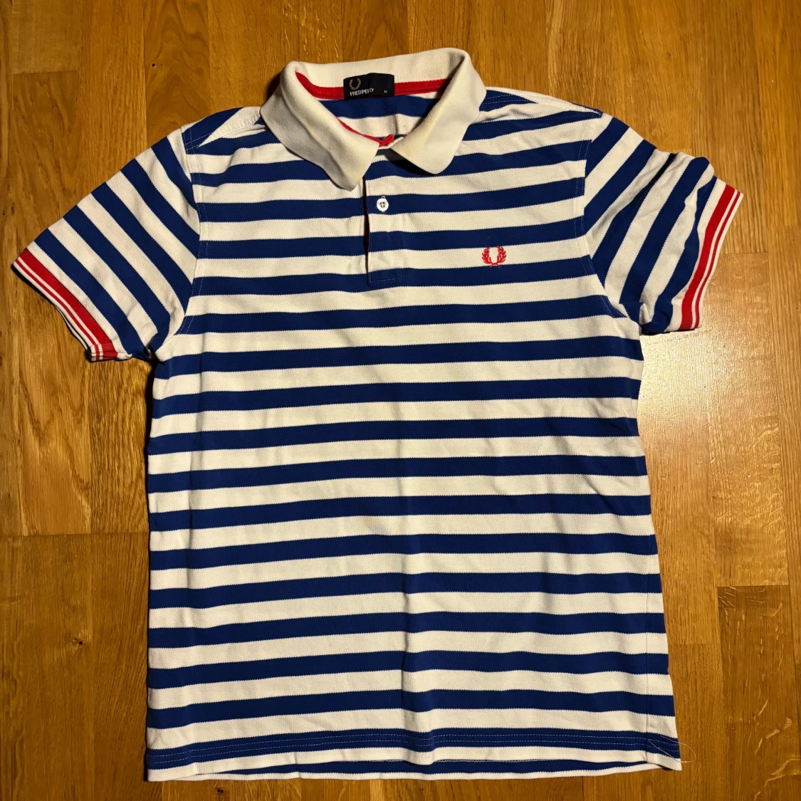 Randig pikétröja från Fred Perry