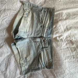 Jeansshorts - Lågmidjade jeanskjol i storlek s-m