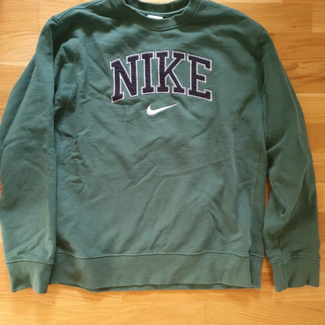 Grön Nike sweatshirt i bomull