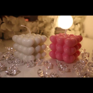 Heart Bubble Candles - A playful twist on the classic bubble candle-each bubble is shaped like a heart. Comes in blush pink and soft white for a dreamy, romantic touch. Perfect for gifting, décor, or simply lighting up cozy evenings.Size: approx. 5 cm x 7.5 cm x 5 cm