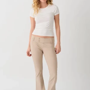 Beige kostymbyxor - Snygga bootcut kostymbyxor. Använd ett fåtal gånger men inget man märker av.