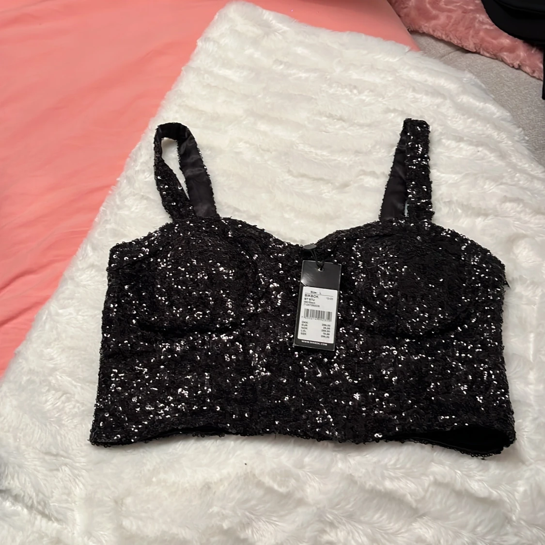 Svart paljettkorsett från Bikbok