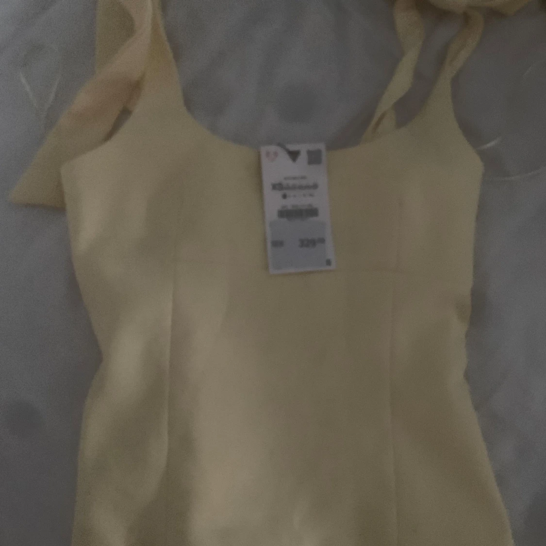 Gul linnetopp med knytband XS - 2