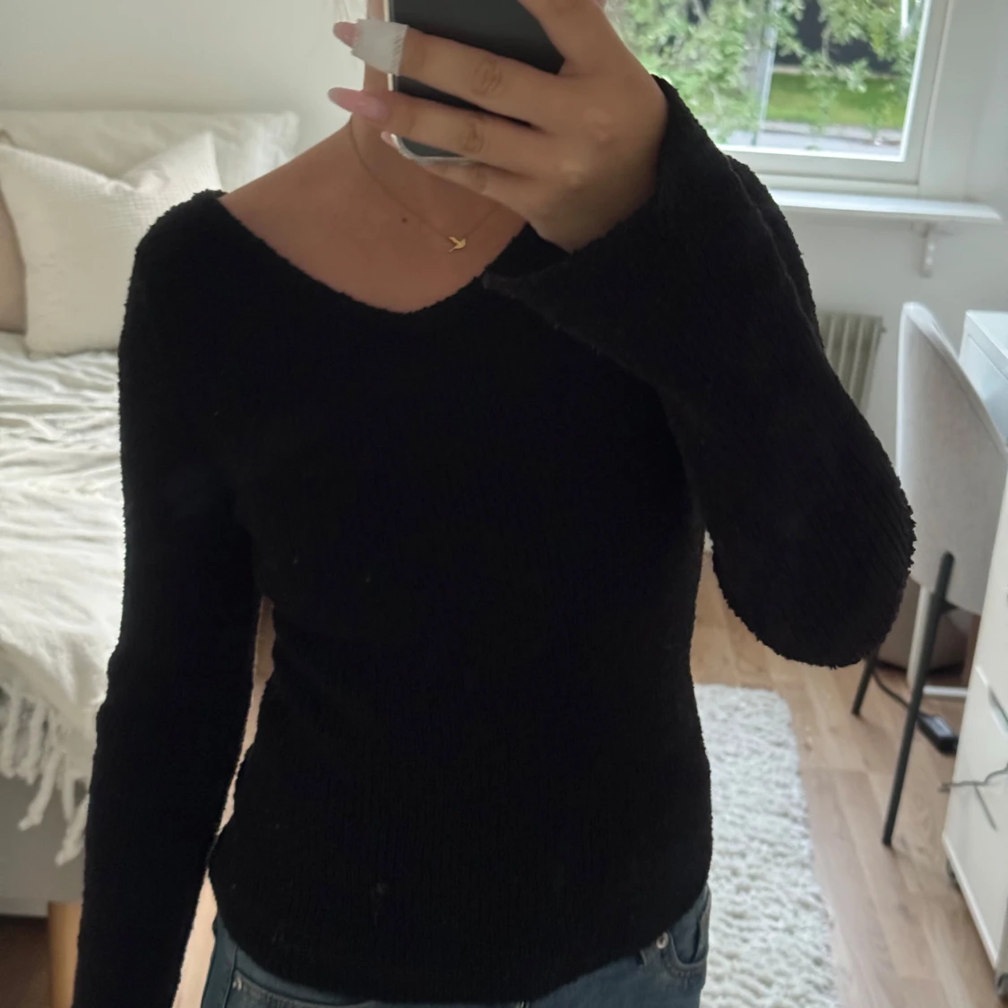 Svart stickad långärmad tröja