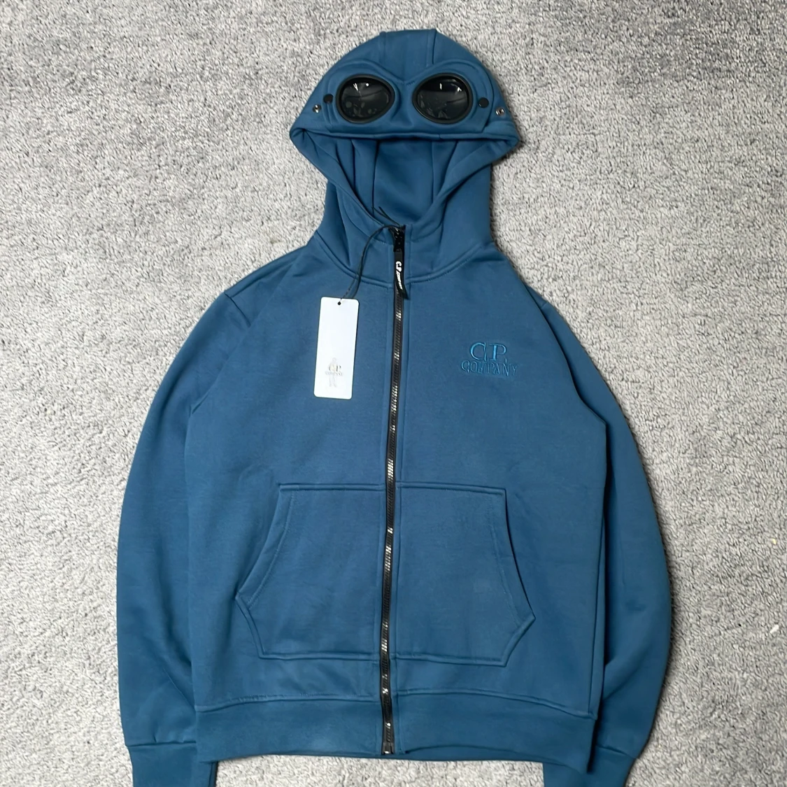 Blå hoodie från C.P Company