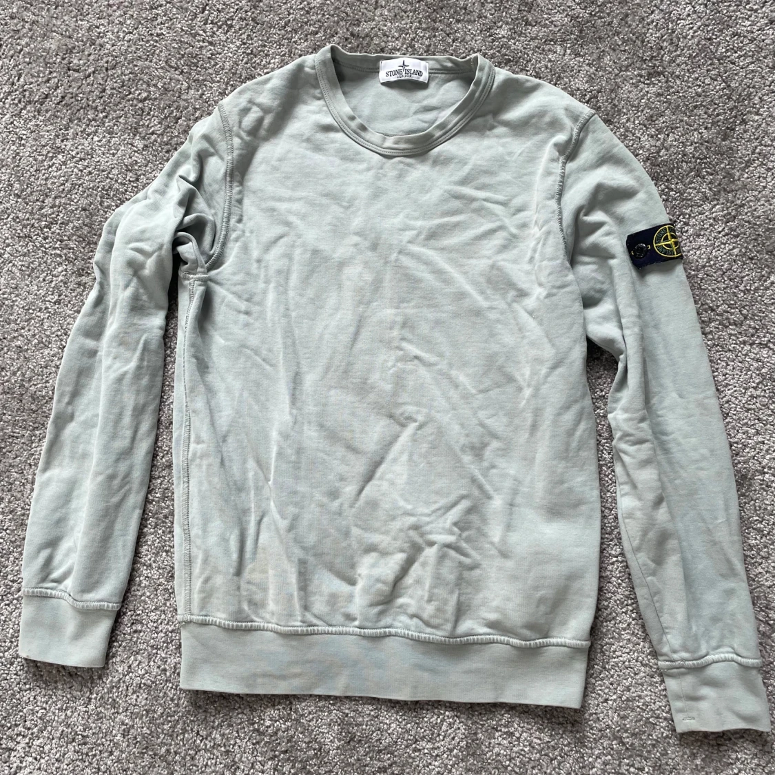 Ljusgrå sweatshirt från Stone Island Junior