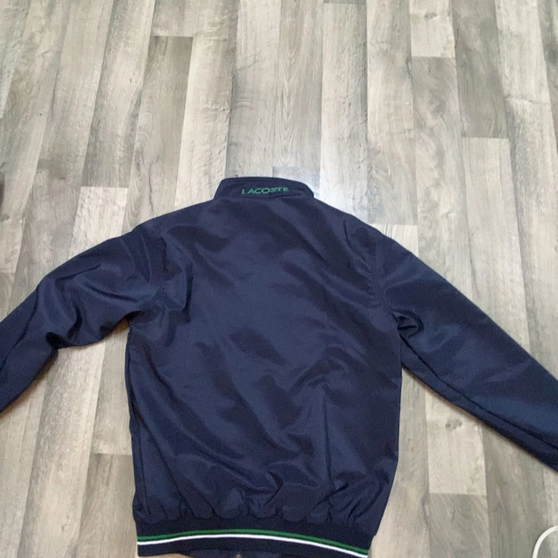 Mörkblå vindjacka från Lacoste - 1