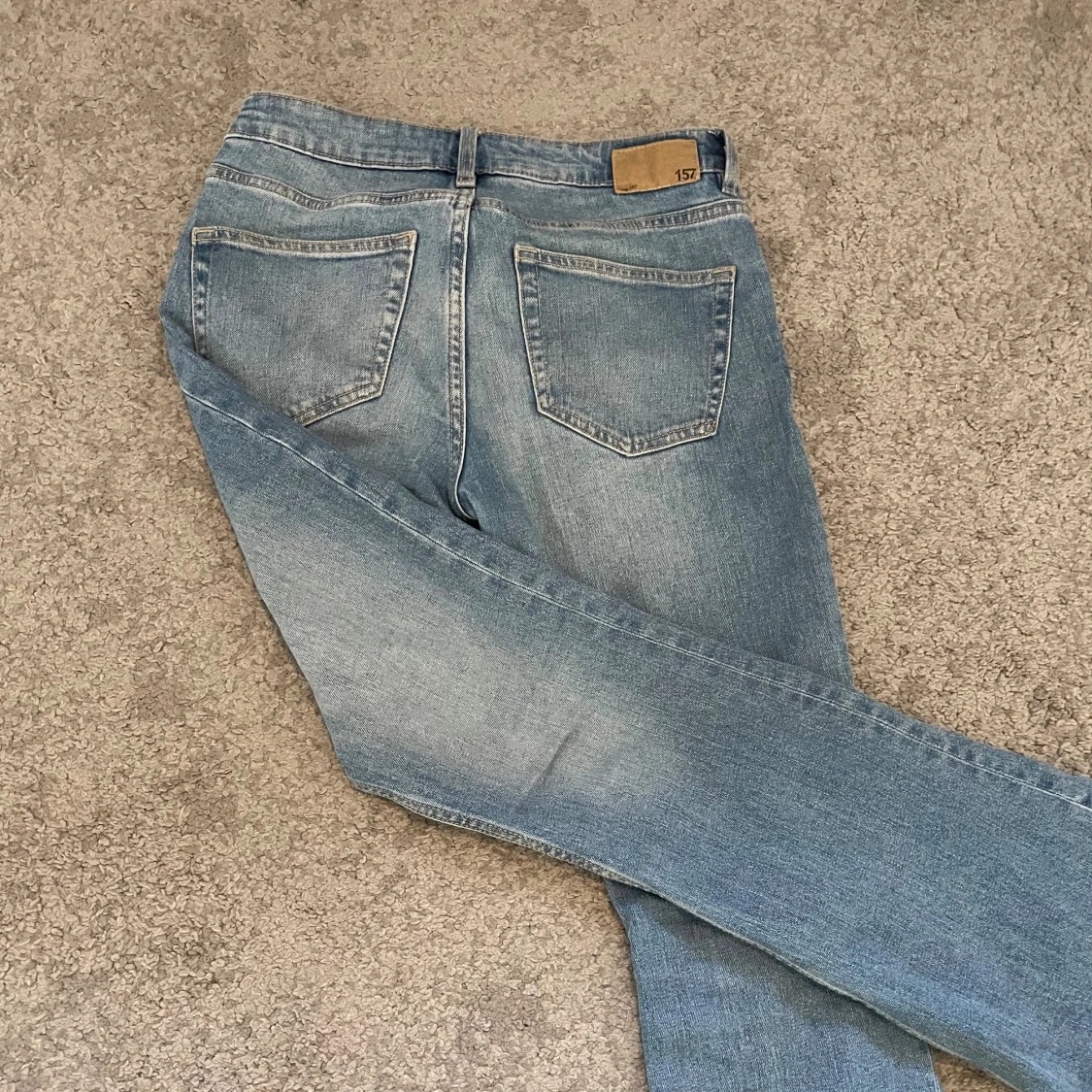 Ljusblå bootcut jeans från 157 - 1