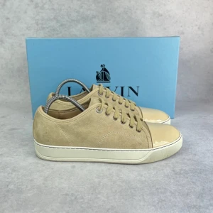 Lanvin DBB1 cap toe sneaker - – Condition: 9/10 - pristine  - Size: 40/UK6  – What is included: Only the sneakers  – Retail price: 5000 + SEK  Please note that Lanvins fit big and our recommendation is to go one size down