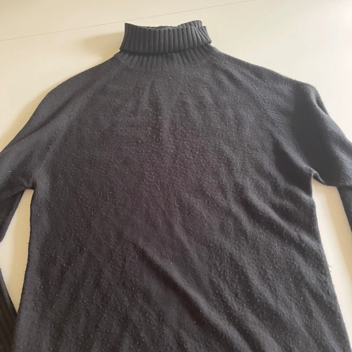 Svart polotröja från Add It