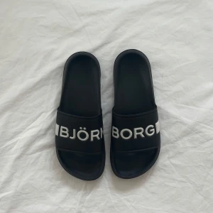 Tofflor - Svarta Björn Borg tofflor