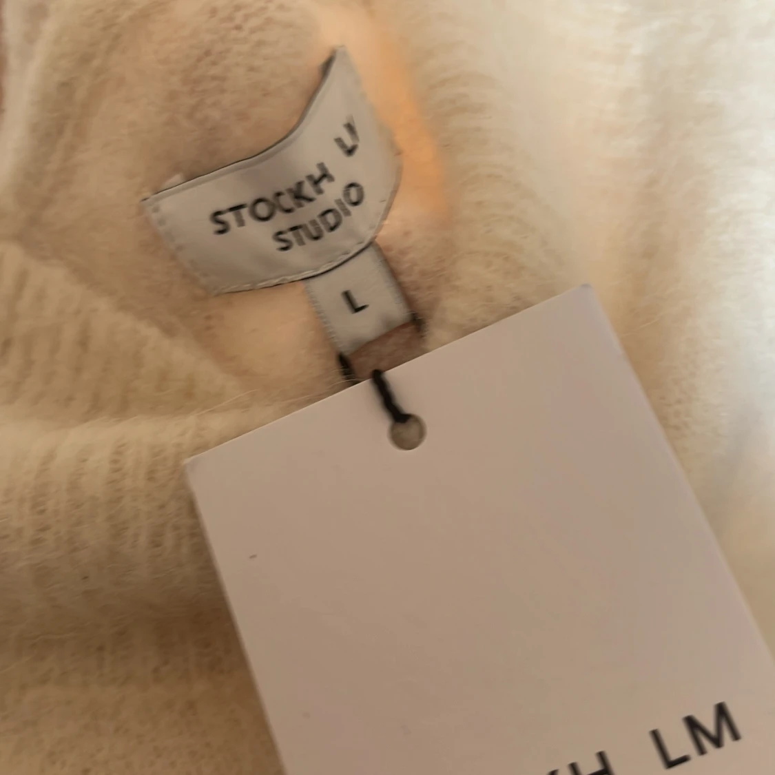 Vit stickad väst från Stockh LM Studio - 2