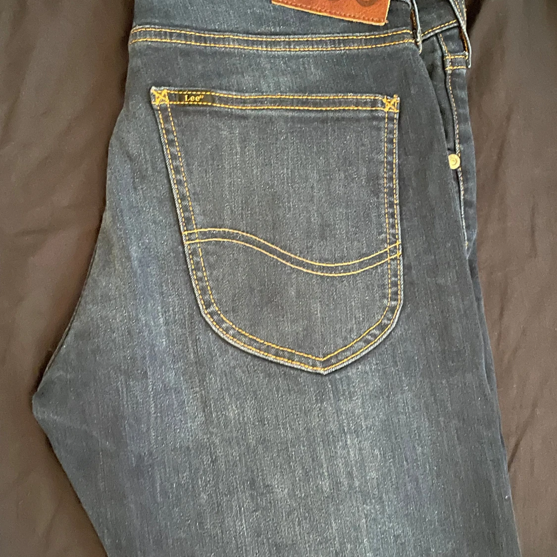 Mörkblå jeans från Lee