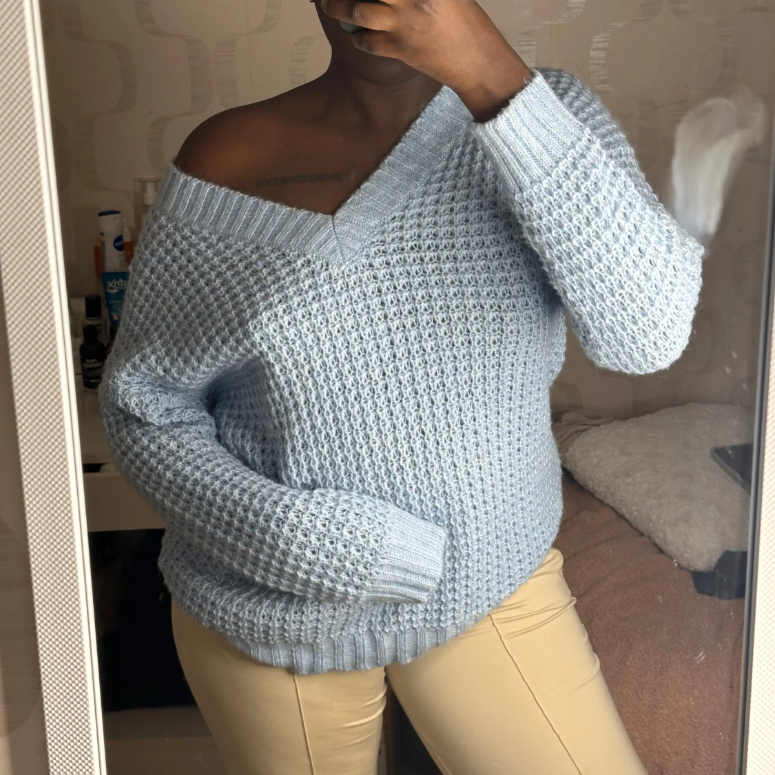 Ljusblå stickad tröja