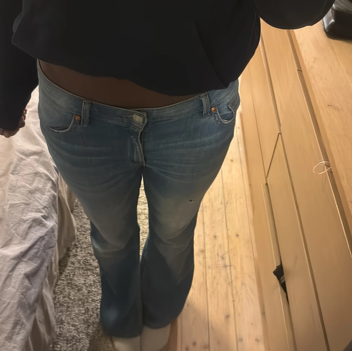 Ljusblå bootcut jeans