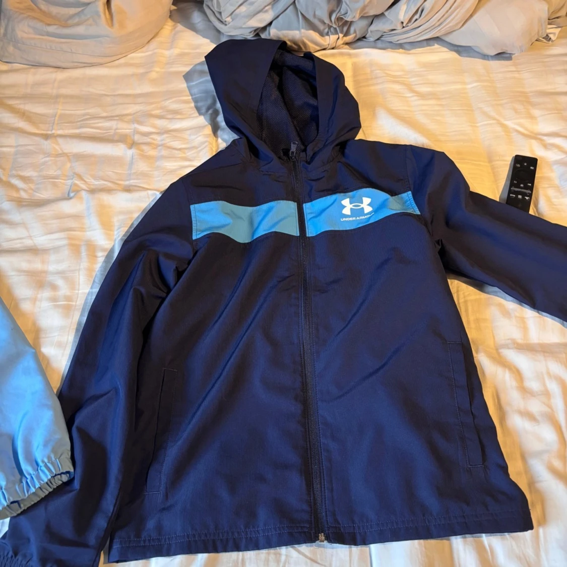 Blå vindjacka från Under Armour
