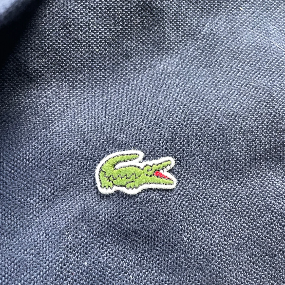 Mörkblå pikétröja från Lacoste - 3