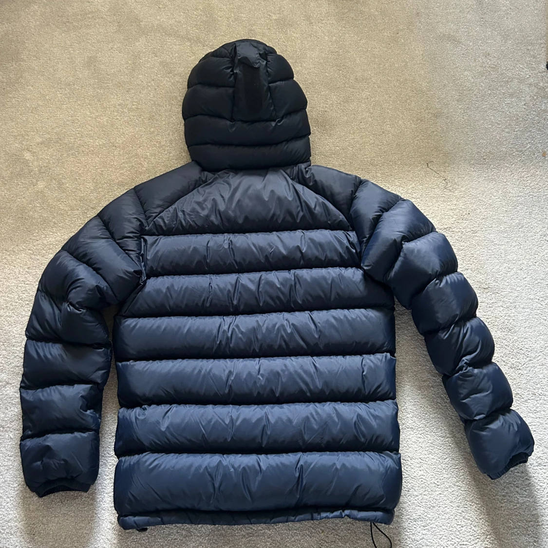 Mörkblå dunjacka Peak Performance - 1