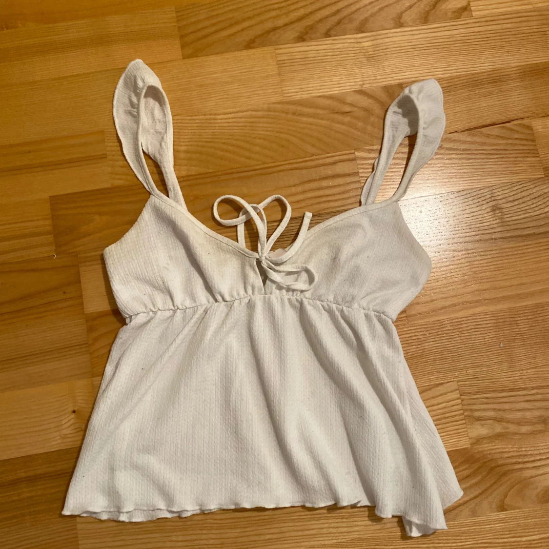 Vit ribbad linnetopp från Nelly - 1