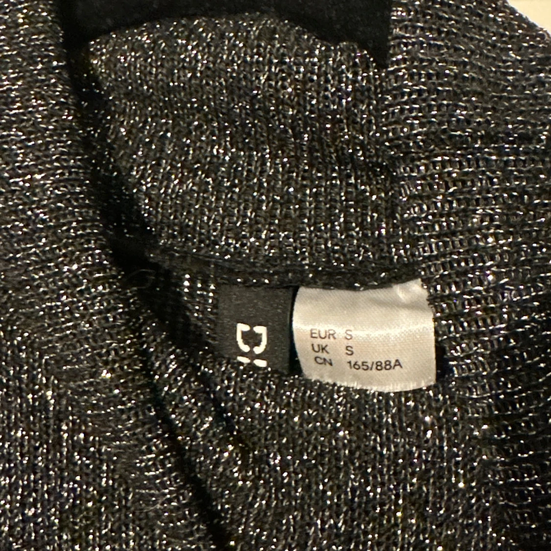 Glittrig svart långärmad topp S - 1