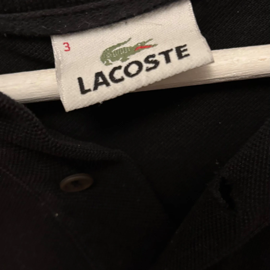 Svart pikétröja från Lacoste - 2